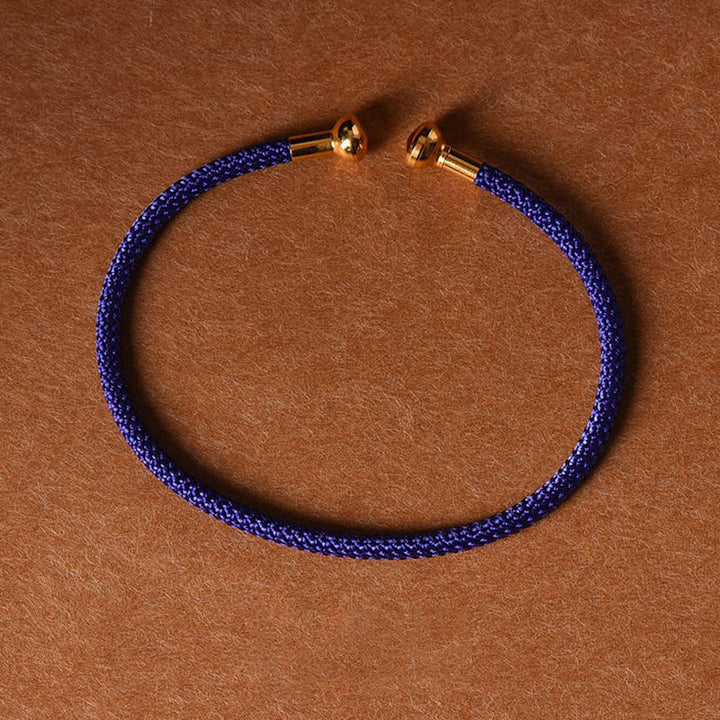 Pulsera de cuerda trenzada de la suerte hecha a mano con diseño simple de Buddha Stones - Azul medianoche - image 30