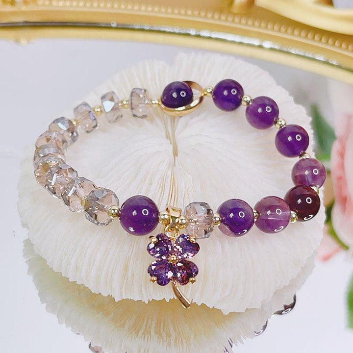 Pulsera con dijes curativos de trébol de cuatro hojas con cristales de amatista y Buddha Stones