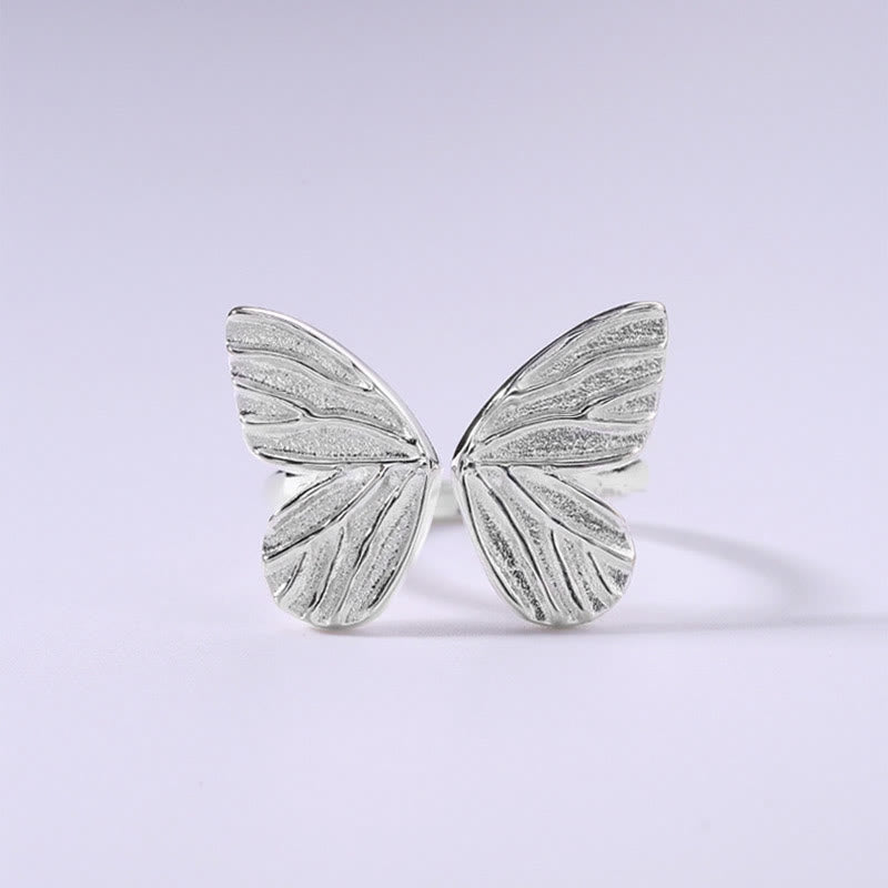 Anillo de libertad de amor con mariposa de plata de ley 925 con Buddha Stones