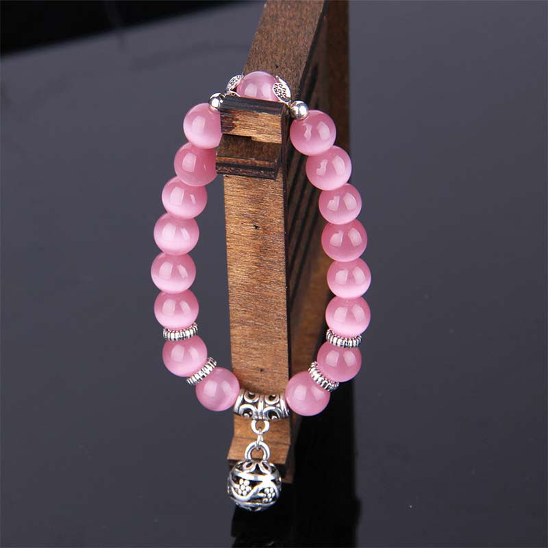 Pulsera de la suerte con ojo de gato tibetano y Buddha Stones