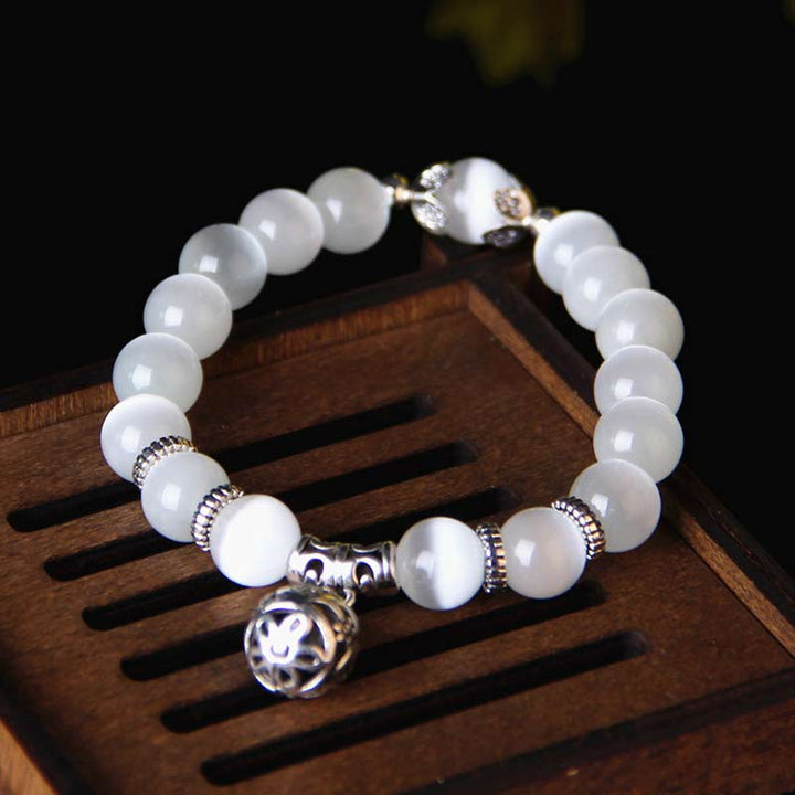 Pulsera de la suerte con ojo de gato tibetano y Buddha Stones