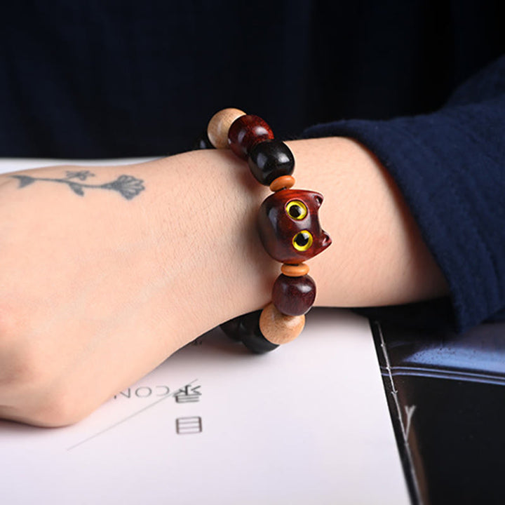 Pulsera de protección con grabado de gato lindo de madera de ébano de sándalo rojo de hoja pequeña con Buddha Stones - image 16
