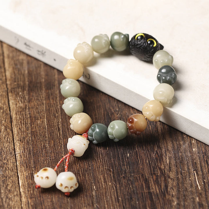 Pulsera de sabiduría de gato de la suerte, madera de ébano, semilla Bodhi Natural, Buddha Stones - image 10