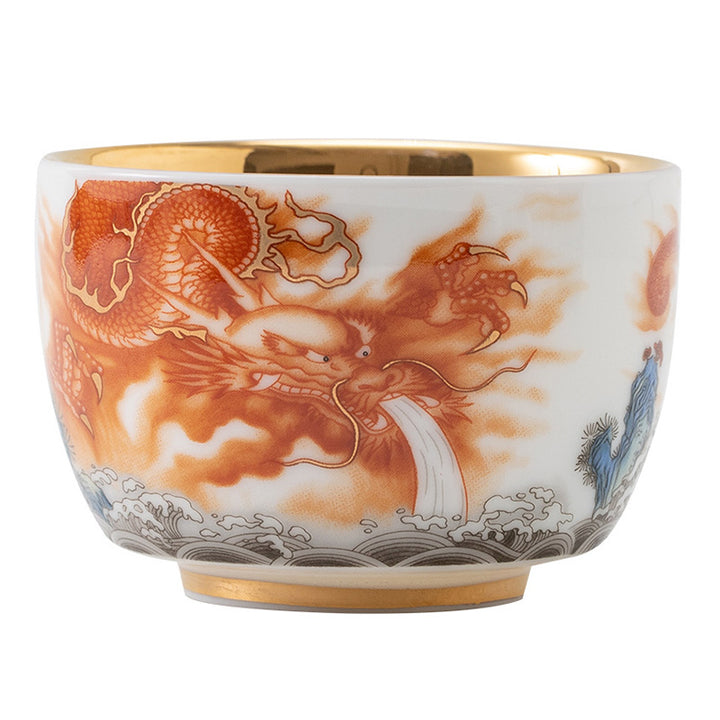 Buddha Stones Dragón Fénix Grulla Sol Océano Olas Taza de té de cerámica dorada Taza de té de Kung Fu 170 ml