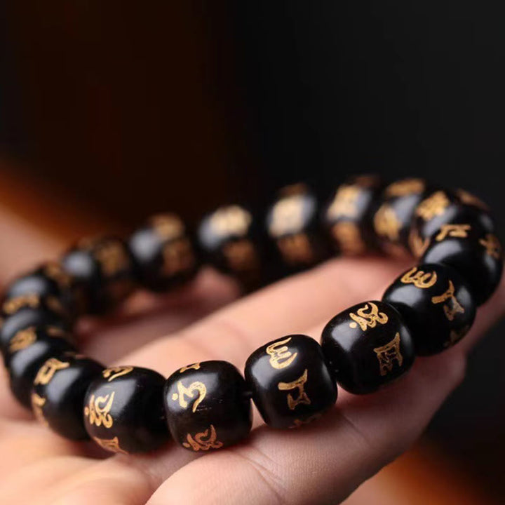 Pulsera de la paz grabada con Buddha Stones, madera de ébano tibetano, Om Mani Padme Hum