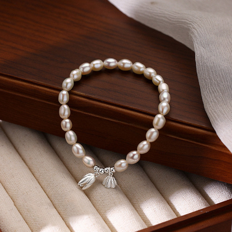 Pulsera curativa de perlas naturales con vaina de flor de loto de plata de ley 999 con Buddha Stones