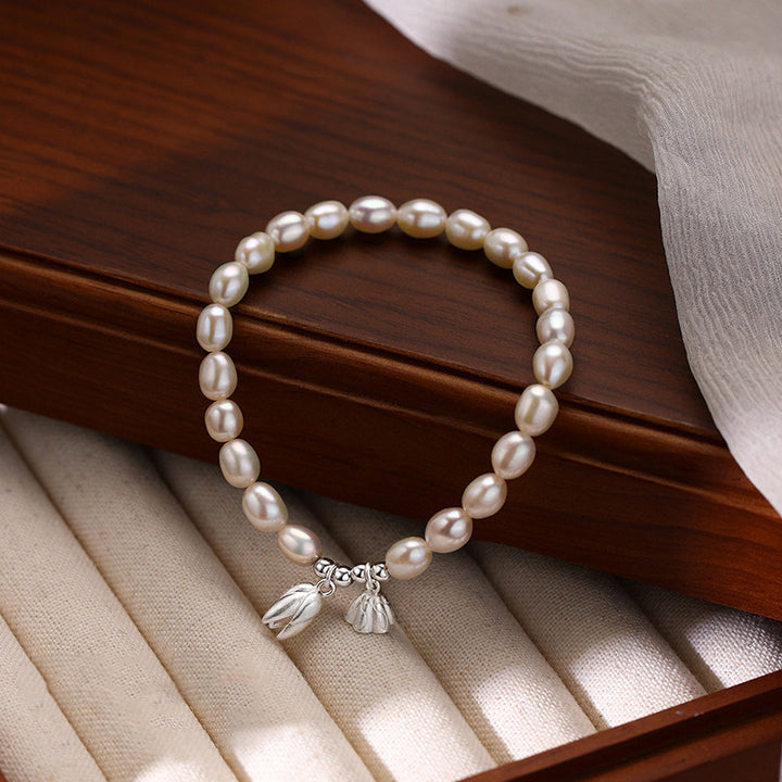 Pulsera curativa de perlas naturales con vaina de flor de loto de plata de ley 999 con Buddha Stones