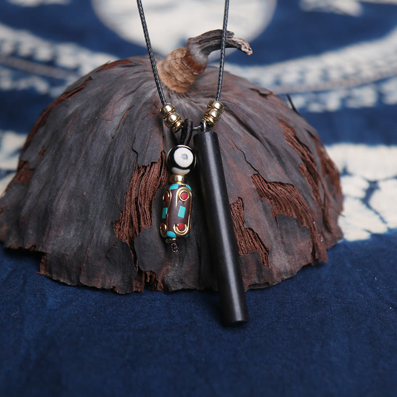 Colgante de collar de paz y calma con cuentas Dzi de madera de ébano tibetano - image 1