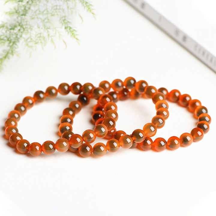 Pulsera de cuentas de fuerza de armonía de ágata de caramelo colorida natural de Buddha Stones