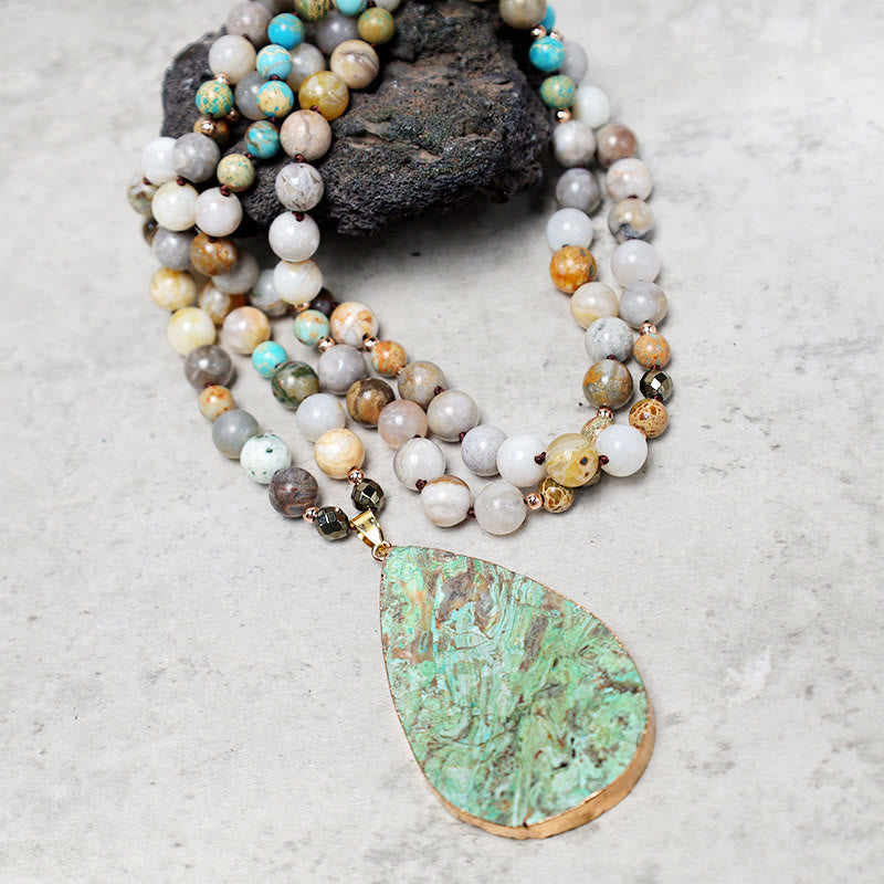 Collar curativo con cuentas de jaspe Picasso del océano natural de Buddha Stones