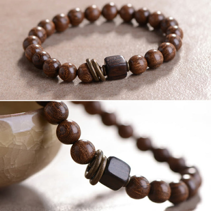 Pulsera de espiritualidad de madera de Phoebe Zhennan con Buddha Stones