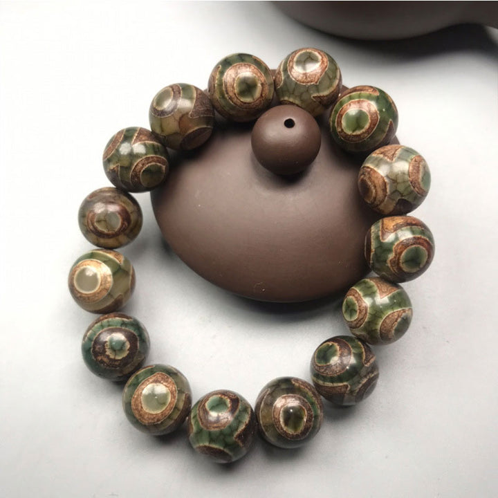 Pulsera de la Suerte de Sardonyx con Cuentas Dzi de Tres Ojos y Buddha Stones