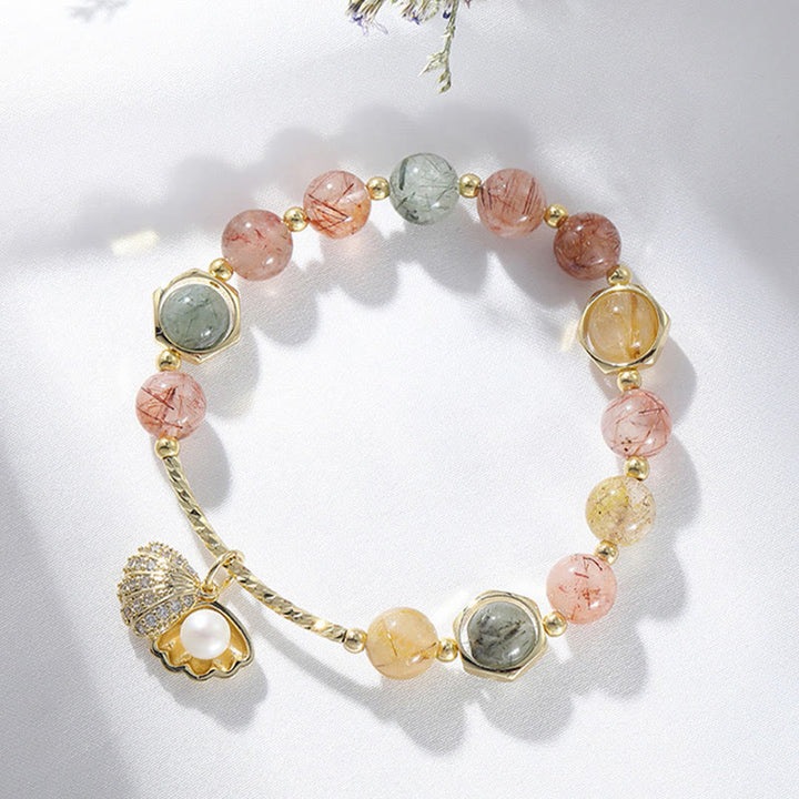 Pulsera de cuentas de protección de concha de cuarzo rutilado de colores naturales con Buddha Stones