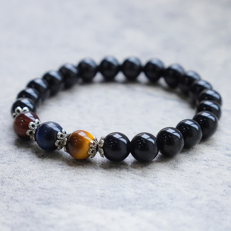 Pulsera de fuerza con Buddha Stones, obsidiana negra natural tricolor y ojo de tigre. - image 1