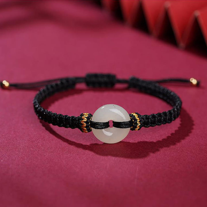 Pulsera trenzada de abundancia de jade con hebilla de paz de Buddha Stones