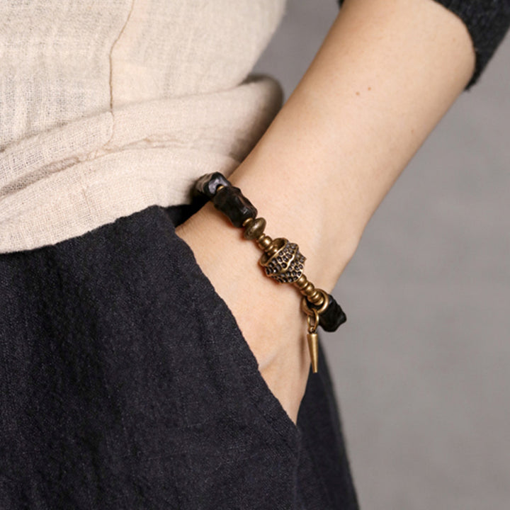 Pulsera de pareja con protección de equilibrio de cobre y madera de ébano con Buddha Stones