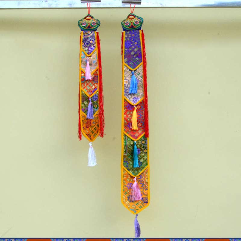 Flor de loto Ocho símbolos auspiciosos Meditación Iluminación Borlas coloridas Arte de pared