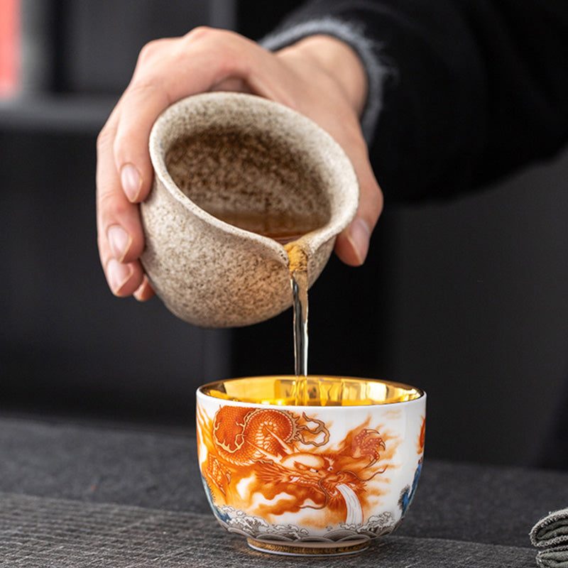 Buddha Stones Dragón Fénix Grulla Sol Océano Olas Taza de té de cerámica dorada Taza de té de Kung Fu 170 ml
