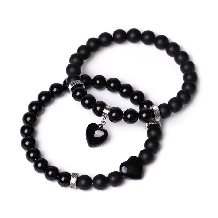 Buddha Stones 2 piezas de piedra de cristal de ónix negro amor protección del corazón pulsera de pareja