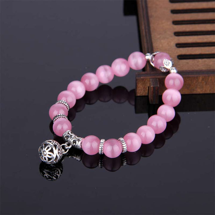 Pulsera de la suerte con ojo de gato tibetano y Buddha Stones