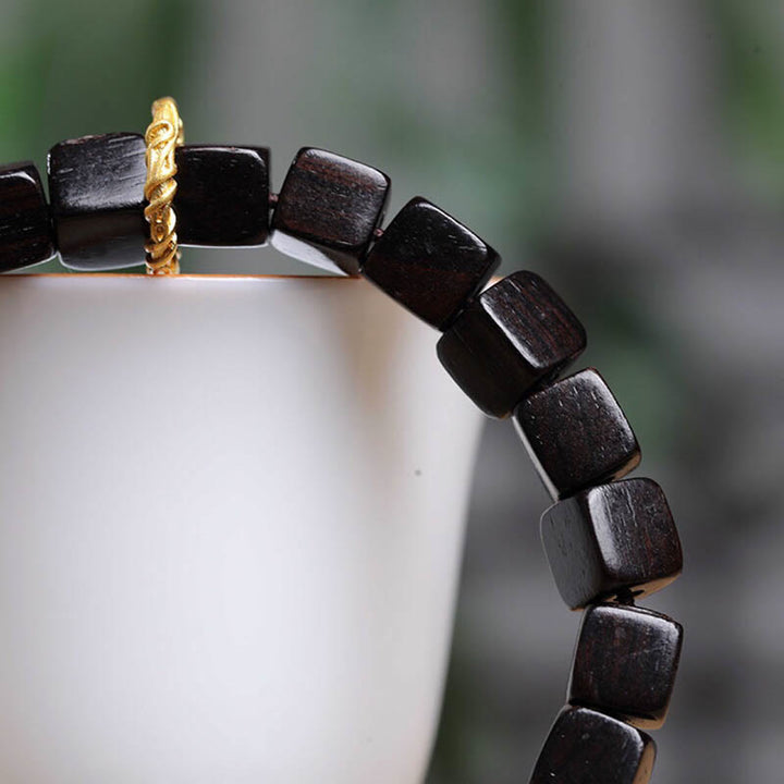 Pulsera de paz y calma con cuentas cuadradas de madera de ébano tibetano con Buddha Stones