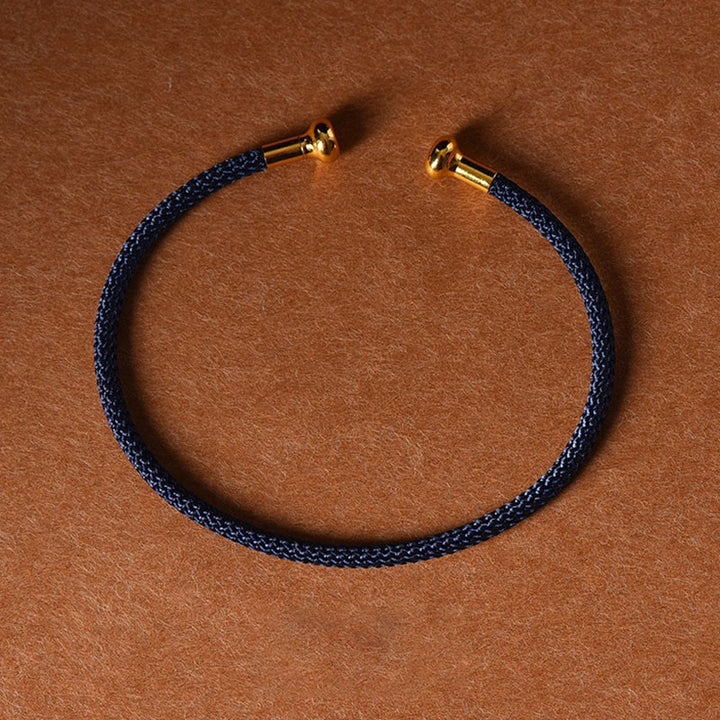 Pulsera de cuerda trenzada de la suerte hecha a mano con diseño simple de Buddha Stones - Azul oscuro - image 25