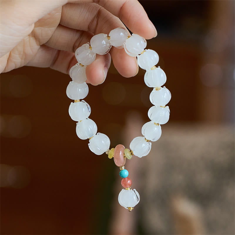 Buddha Stones Liuli cuentas de cristal diseño de loto fluorita marfil fruta bailando León encanto pulsera de iluminación