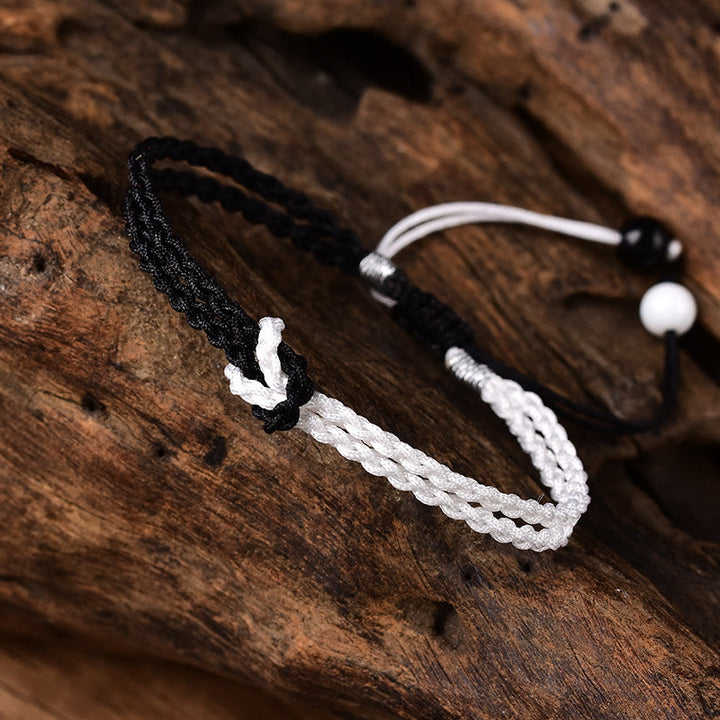 Pulsera curativa trenzada de cuerda blanca y negra hecha a mano con Buddha Stones