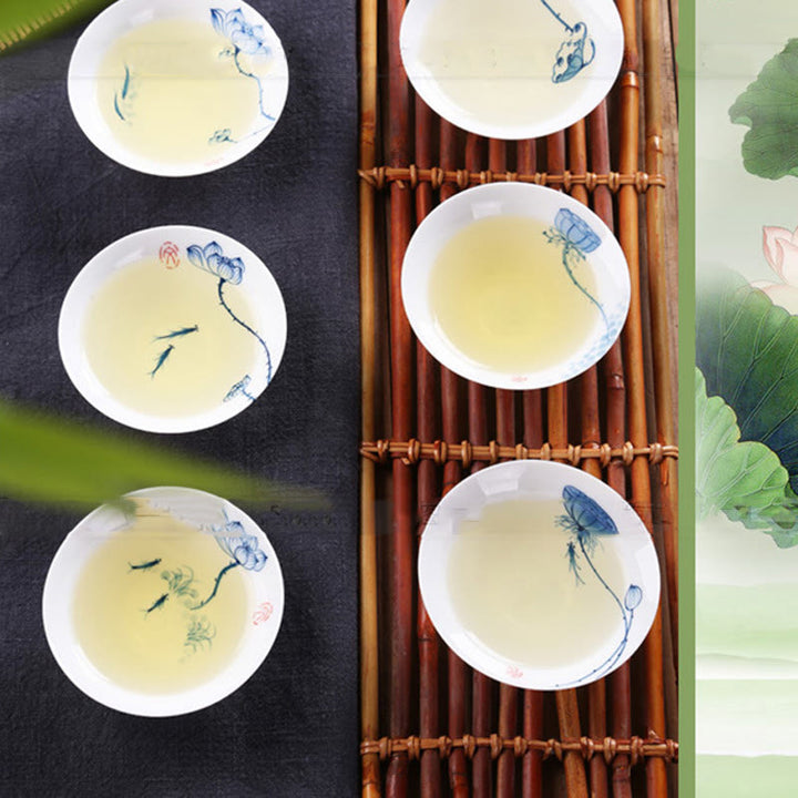 Buddha Stones Vintage ciruela orquídea bambú crisantemo loto pez Koi taza de té de cerámica tazas de té Kung Fu