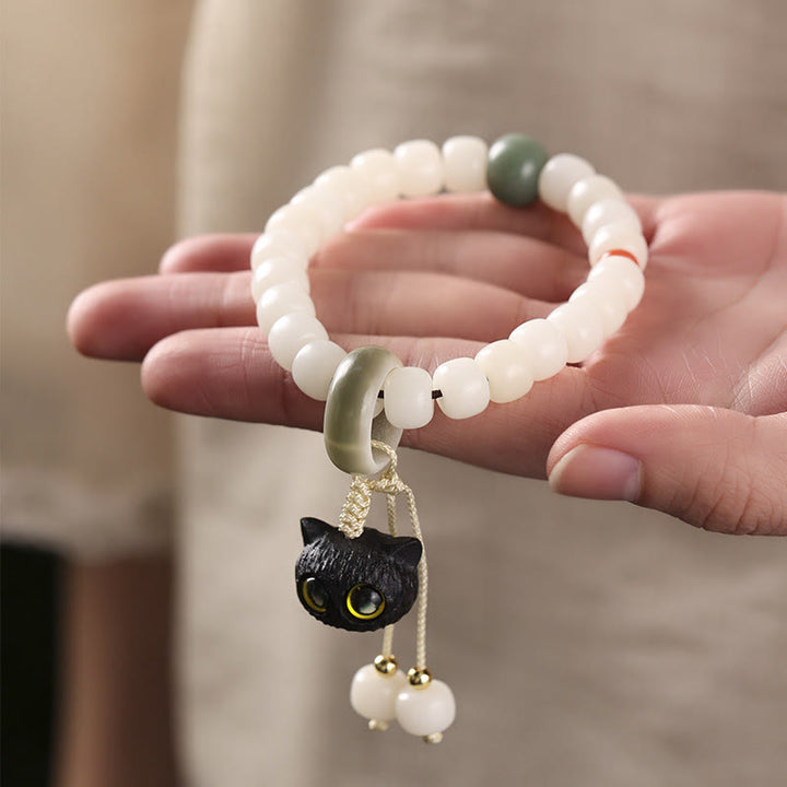 Pulsera de armonía de paz con dije de gato encantador de madera negra africana con semillas de Bodhi naturales de Buddha Stones - image 4