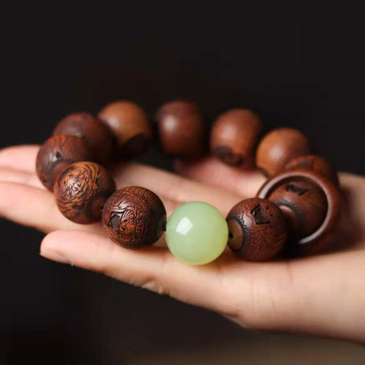 Pulsera de protección de tigre con grabado de palisandro tibetano con Buddha Stones
