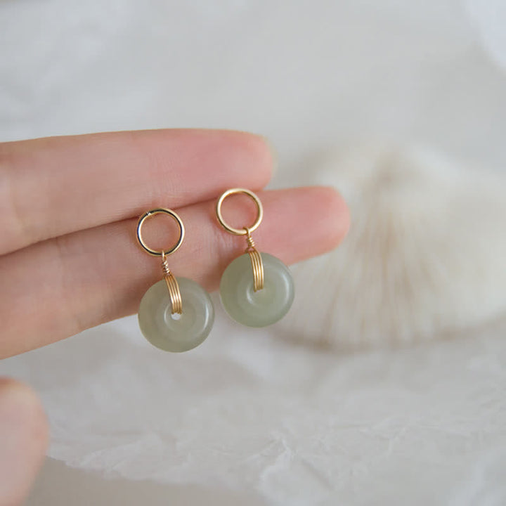 Pendientes colgantes de suerte con hebilla de paz de jade redondo