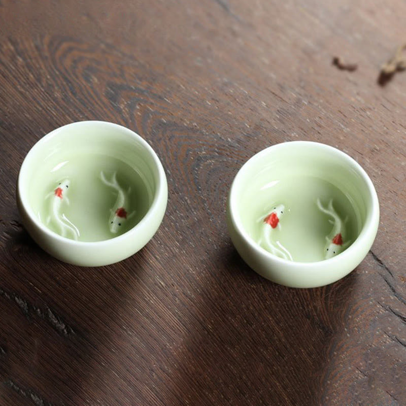 Taza de té de cerámica con forma de pez koi de colores y Buddha Stones