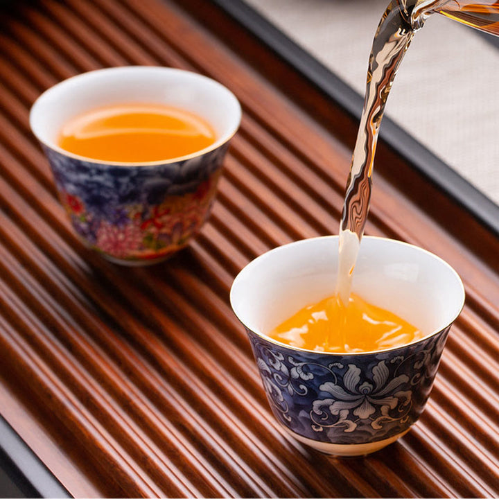 Taza de té de cerámica de porcelana azul y blanca, Buddha Stones, flores coloridas, orquídeas, olas del mar, taza de té de Kung Fu
