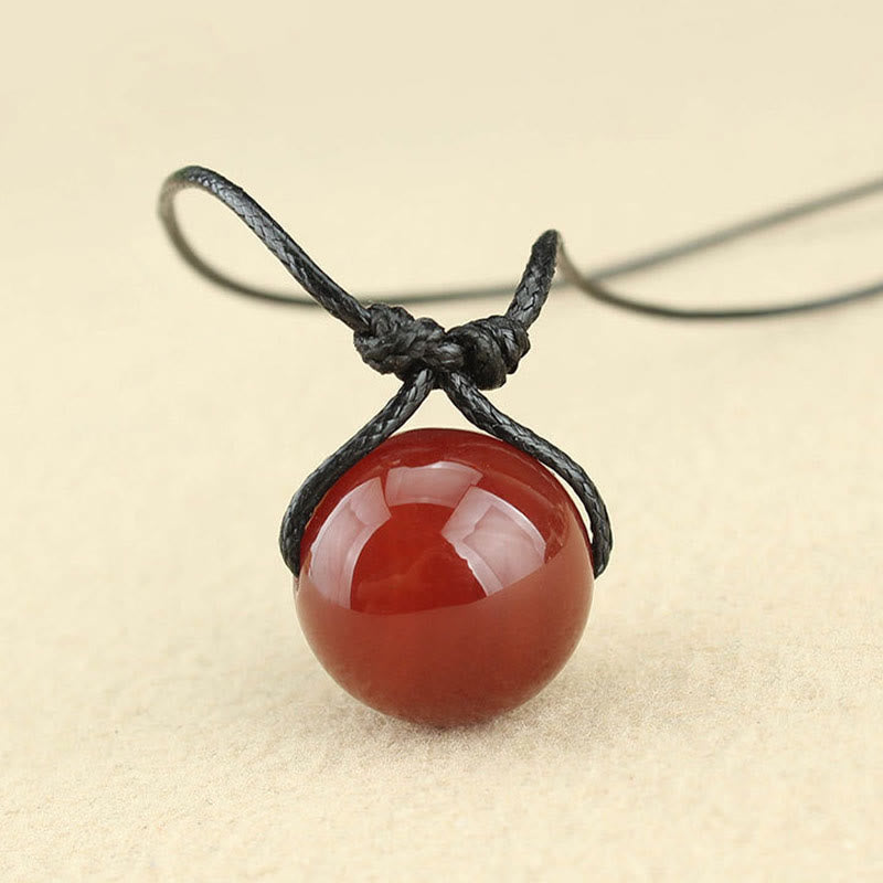 Collar con colgante de cuerda de cuero con cuentas de ágata roja y Buddha Stones