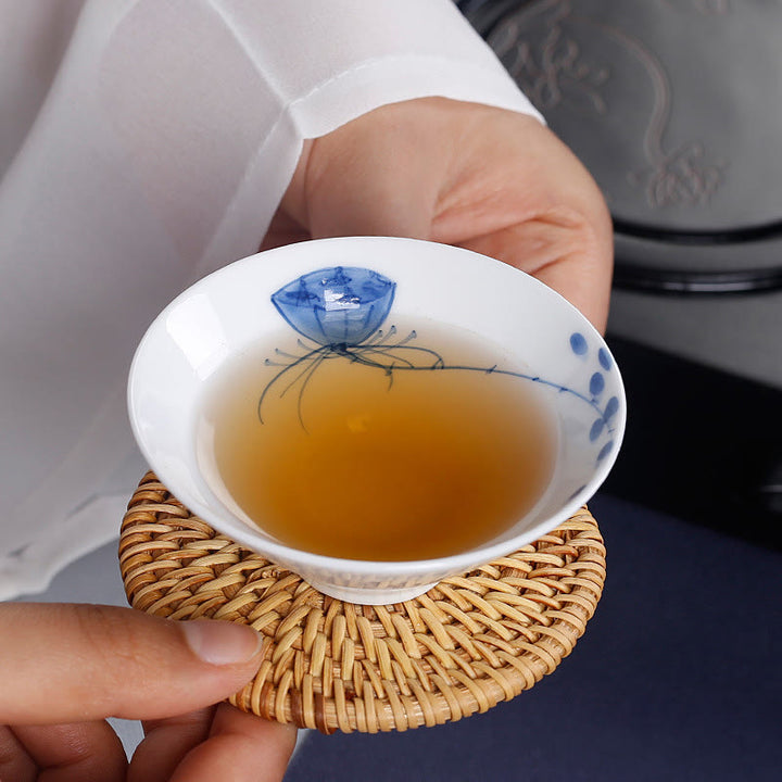 Buddha Stones Vintage ciruela orquídea bambú crisantemo loto pez Koi taza de té de cerámica tazas de té Kung Fu