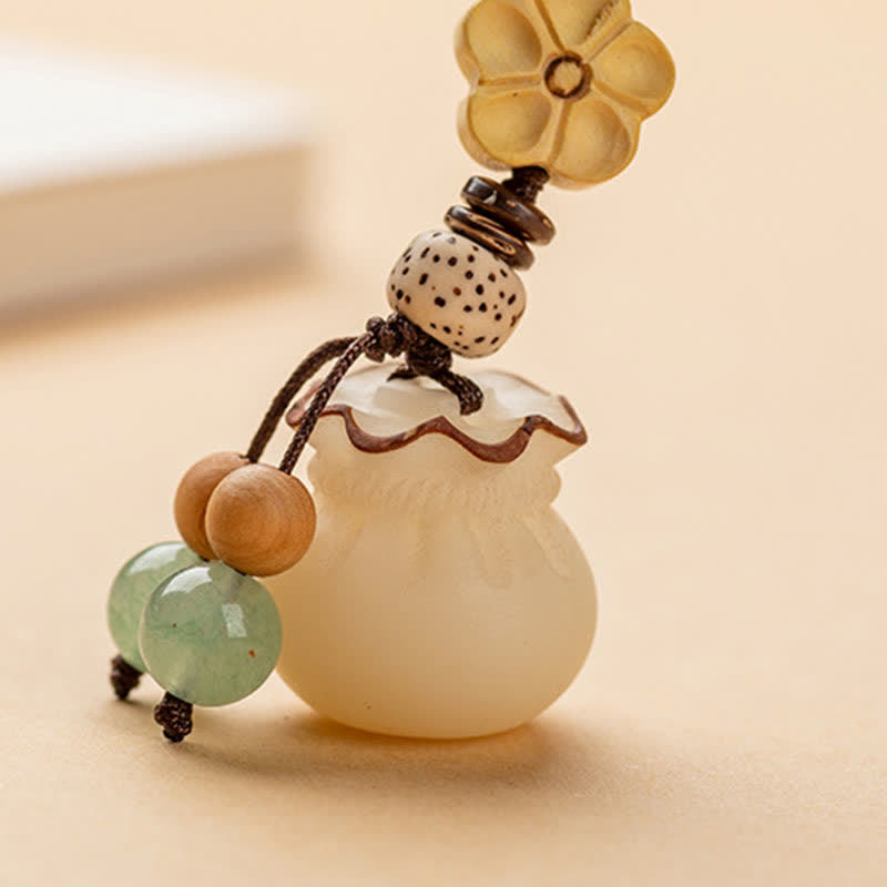 Llavero de prosperidad y bendición de flores, bolsa de dinero con semillas de Bodhi Natural, Buddha Stones