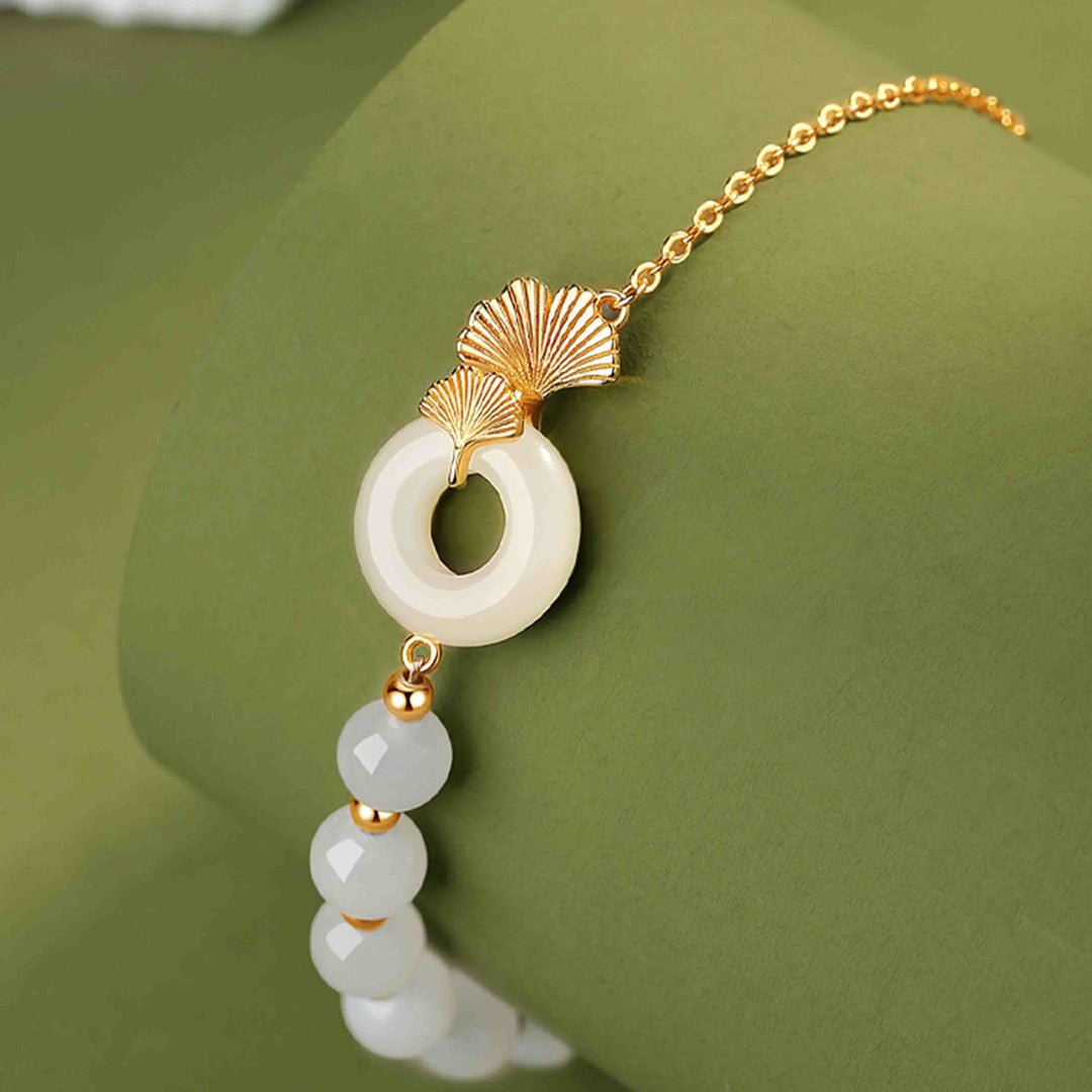 Pulsera de la suerte de hoja de ginkgo con hebilla de paz de jade blanco hetiano de plata de ley 925 con Buddha Stones