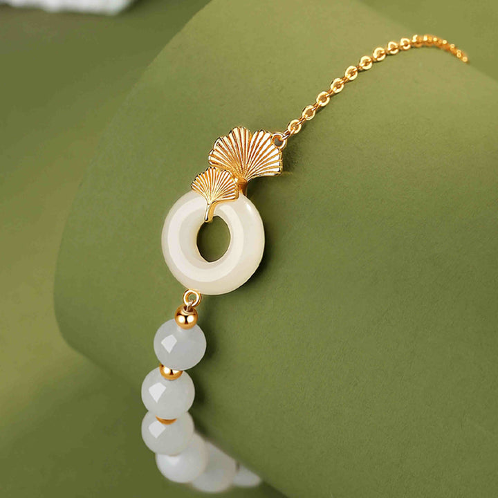 Pulsera de la suerte de hoja de ginkgo con hebilla de paz de jade blanco hetiano de plata de ley 925 con Buddha Stones