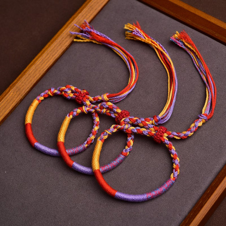 Buddha Stones Pulsera tibetana de cuerda multicolor inspirada en el folclore - image 0