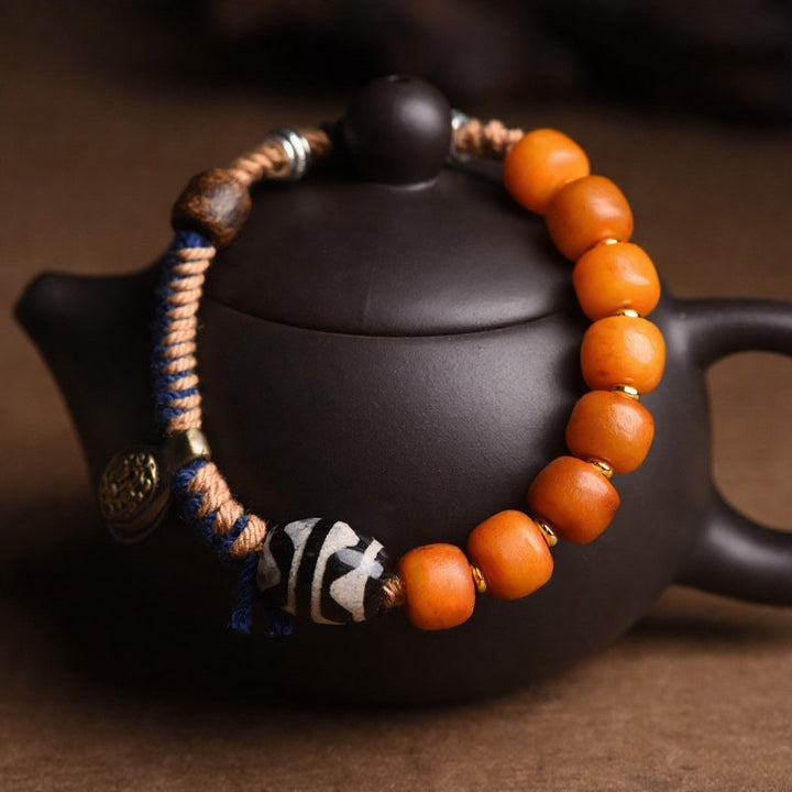 Buddha Stones Pulsera de la riqueza con cuentas Dzi y detalles de latón tibetano - image 9