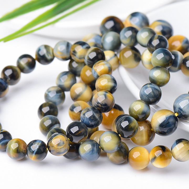 Pulsera de fuerza y valor con protección de ojo de tigre de Buddha Stones