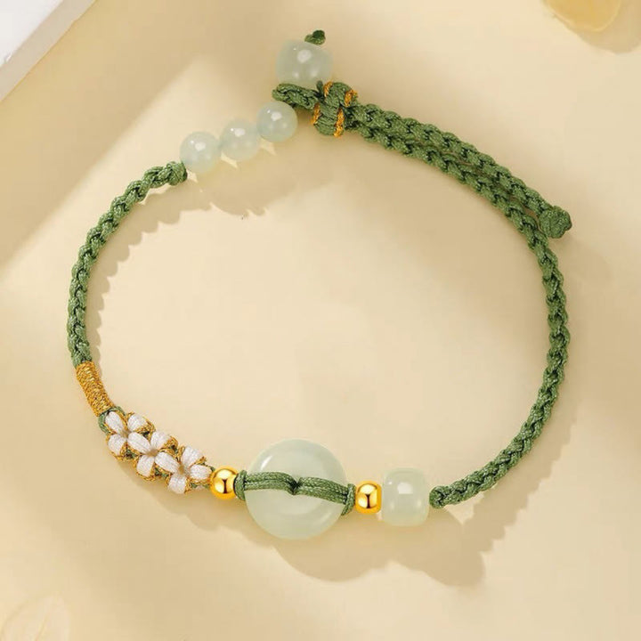 Pulsera trenzada de flor de melocotón de la suerte con hebilla de la paz de jade hetiano de Buddha Stones