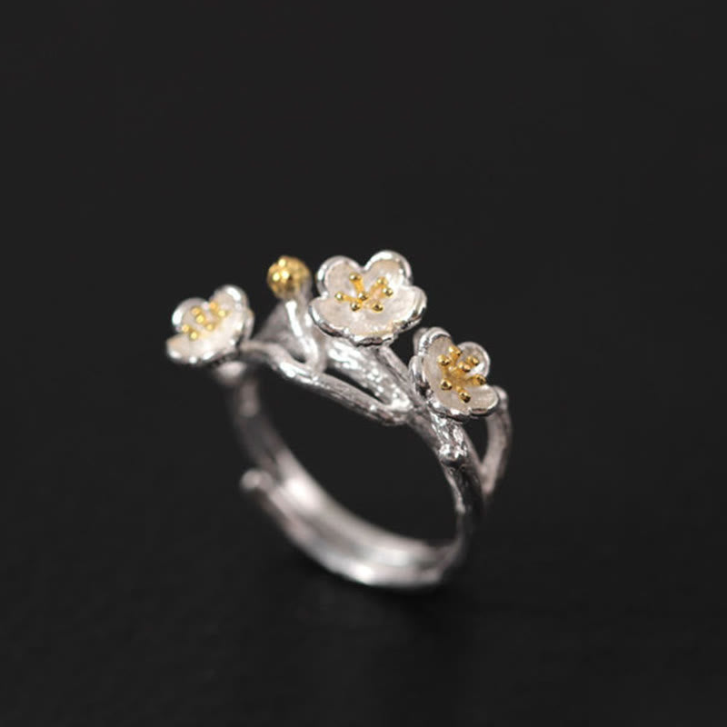 Pendientes de bendición floral de flor de ciruelo de plata de ley 925 con Buddha Stones