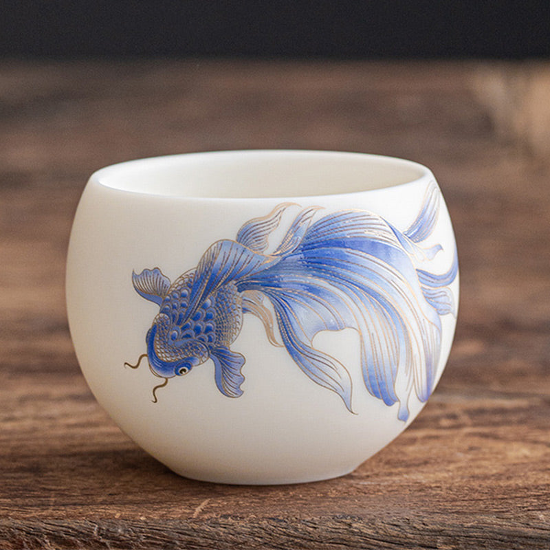 Taza de té de cerámica de porcelana blanca, pez Koi, Buddha Stones, taza de té de Kung Fu