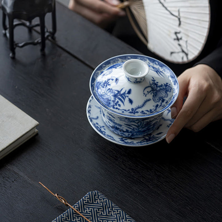Buddha Stones Porcelana Azul Y Blanca Loto Pez Koi Danza Del León Sandía Cerámica Gaiwan Sancai Taza De Té Kung Fu Taza De Té Y Platillo Con Tapa 300ml
