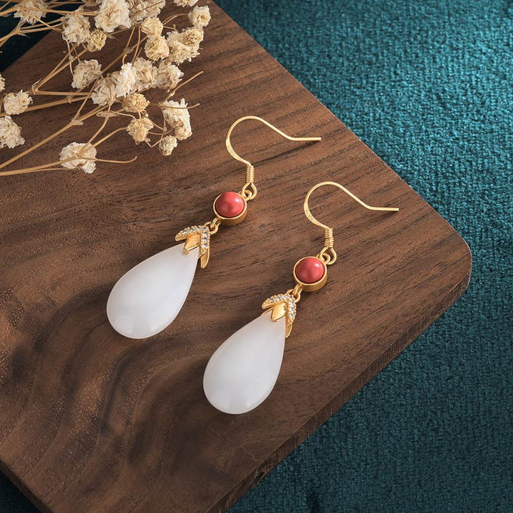 Pendientes colgantes de la suerte de jade blanco FengShui con Buddha Stones