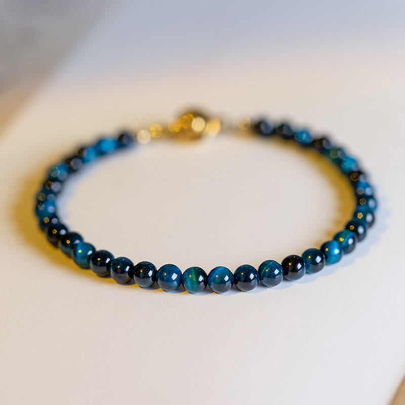 Pulsera de cadena de protección con piedra de ojo de tigre azul natural de Buddha Stones