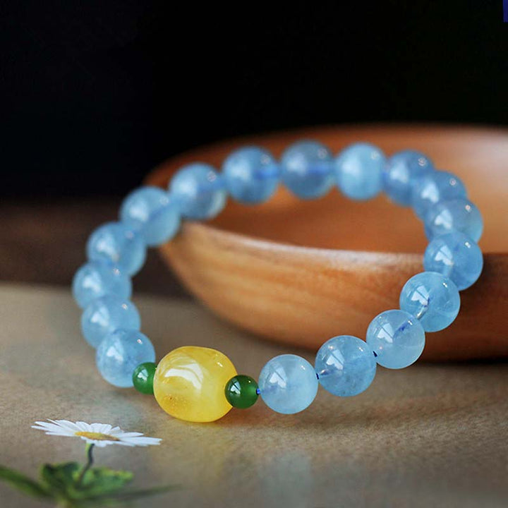 Pulsera curativa de serenidad con cuentas de ámbar y aguamarina natural