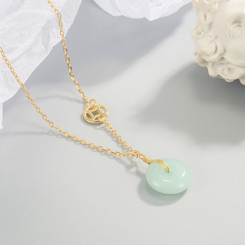 Collar con colgante de abundancia con hebilla de paz y moneda de cobre con carácter de Jade Fu de Buddha Stones